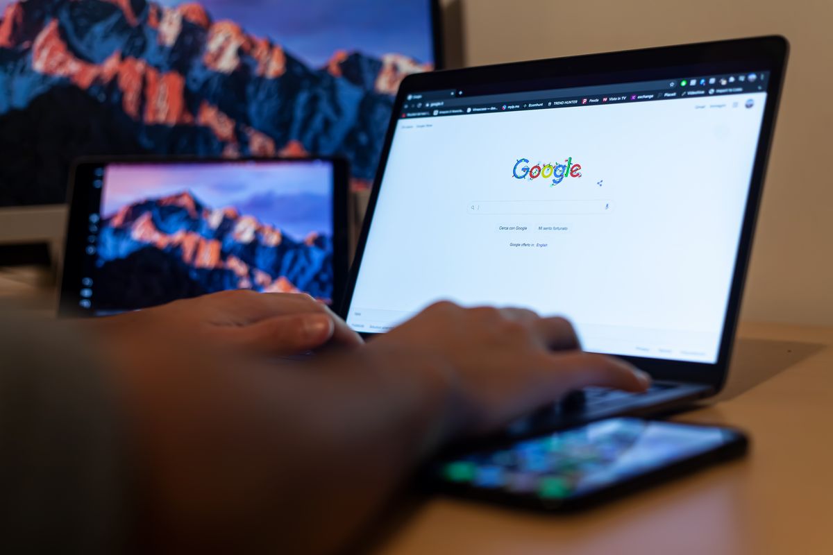 Google search open on a laptop, where prospective clients search for and find life coaches